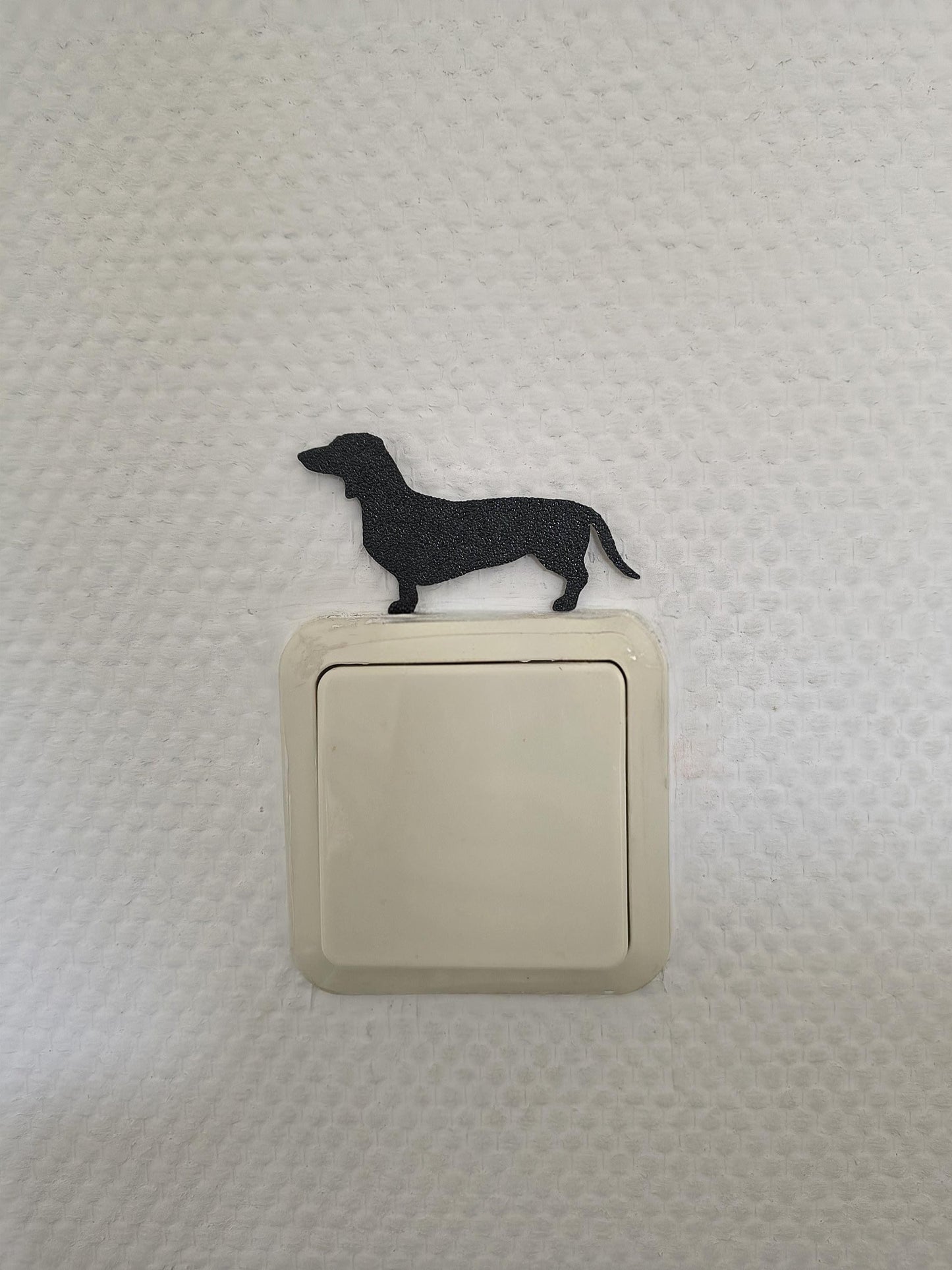 Lichtschakelaar decoratie voor op de muur van een teckel. Te plaatsen zonder boren