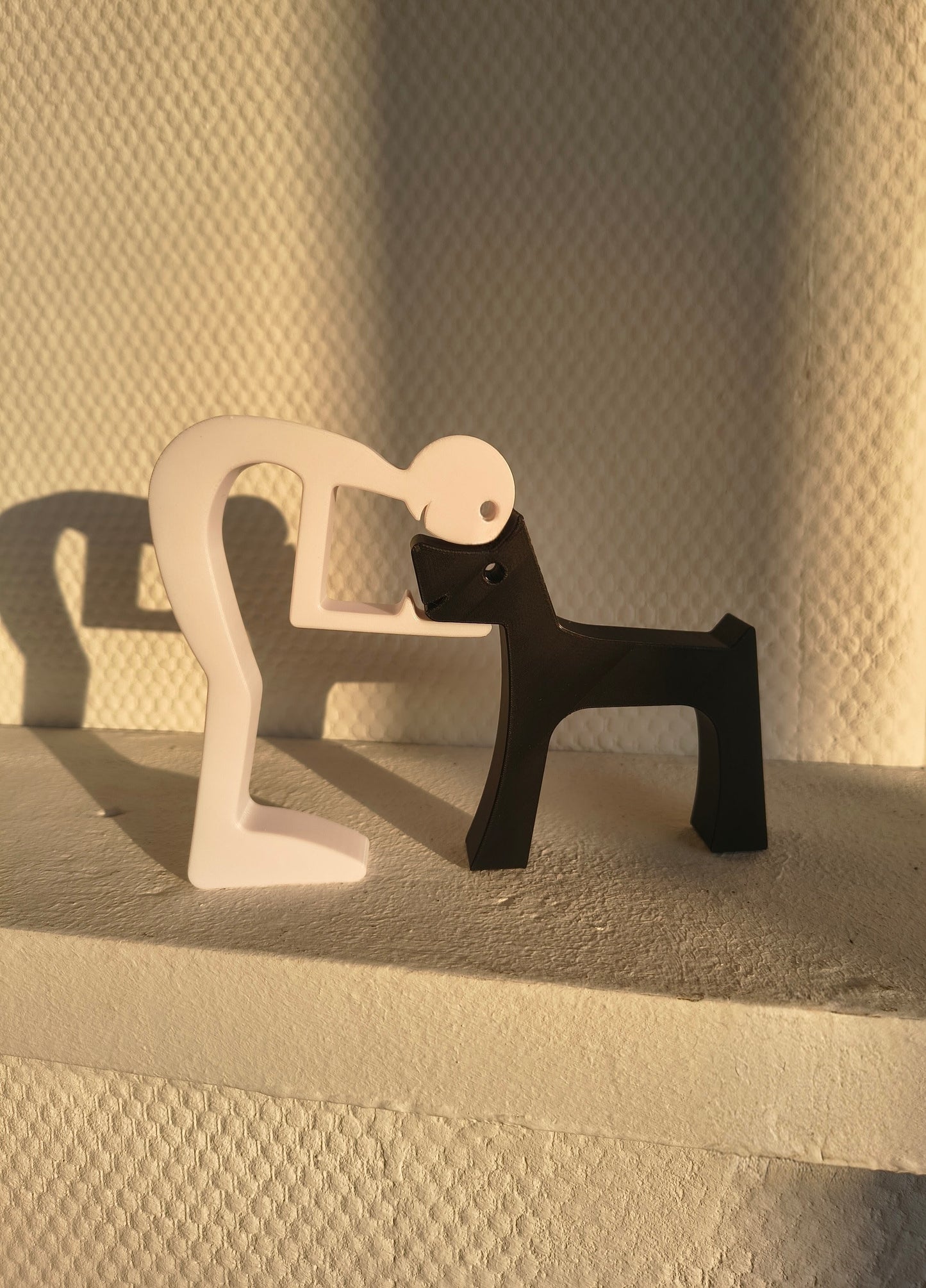 Puzzel beeldje van baasje met hond