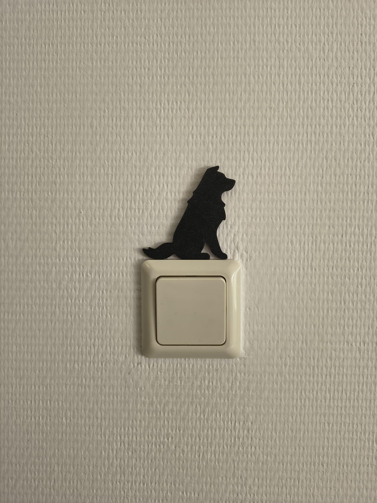 Lichtschakelaar decoratie van een border collie, eenvoudig te plaatsen zonder boren