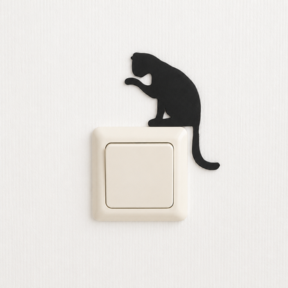 Katten lichtschakelaar decoratie - kat die pootje wast