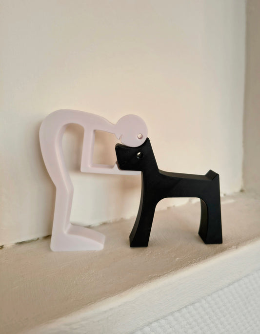 Puzzel beeldje van baasje met hond